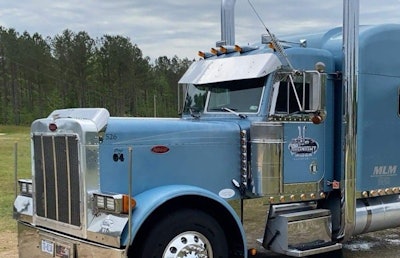 That dream truck: Owner-operator Morris's 2004 Peterbilt 379 Extended Hood, powered by a 550-hp Cat with a 13-speed.