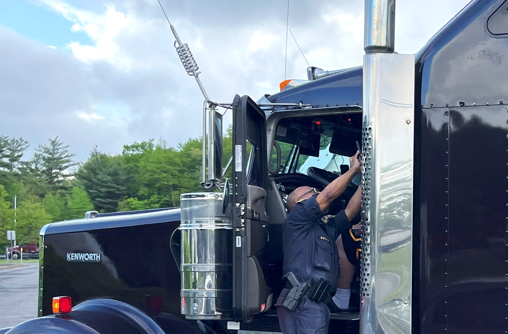 Inspector At Driver Door By Alex