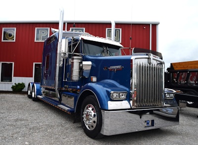 This Horse and Buggy Express 6NZ-Cat-powered 2000 Kenworth W900L, featuring the Studio Sleeper, powered Rissler and his family's work near the start of trucking career as a business owner.