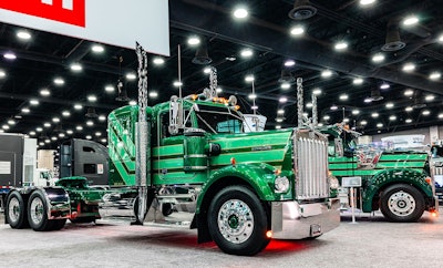 The photo here from the Kenworth booth at MATS shows in the foreground the a custom 1982 Kenworth W900A owned by an MHC customer. It's outfitted with the classic Cape Cod paint scheme, as is the W990 MHC built special for the show in the background.