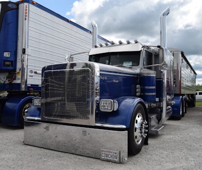 Owner-operator Zach hauls with his authority with this 2017 Peterbilt 389, powered by a 2WS Caterpillar 3406E and featuring an 18-speed transmission and a 275-inch wheelbase. It's hooked to a hopper painted to match.
