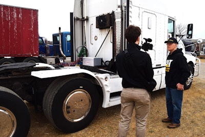 Speaking of weight savings, Kitzhaber's T600 is set up with super singles on the drive and tag axle, likewise known for fuel economy benefits. In the photo, too, you can see the condenser for the Thermo King TriPac auxiliary power unit on the rear sleeper wall, and at the bottom of that wall on the deck a Proheat block and bunk heater, both units running on fuel in a dedicated diesel tank. Kitzhaber can use No. 1 diesel there, with tax benefits, too. (The Proheat's been on the truck for five years or so, Kitzhaber estimated, after a run of Espar heaters he used for bunk heat for 20 years.)