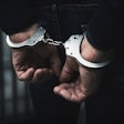 Man In Handcuffs Adobe Stock 309900017