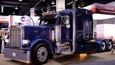 ReVolt Motors' diesel-electric hybrid retrofit Peterbilt 379 looks mostly like a traditional diesel truck from the outside with the hood down.