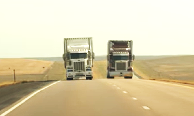 Two Trucks On Highway