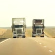 Two Trucks On Highway