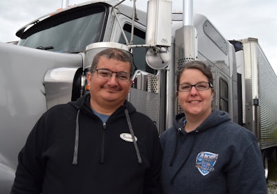The Kenworth's outfitted with the Studio Sleeper, with certainly more room than Wes (pictured) had previously with a 46-inch flattop Pete like Paul's. It proved simply too crowded for Bev (Wes's wife, also pictured) to comfortably come along. The 2019 KW is here matched with an unpainted trailer in the Rissler fleet. Paul planned to paint the doors silver to help complete the match.