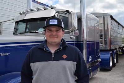 Owner-operator Zach is here pictured with the 2017 Cat-repowered 389 and Timpte hopper.