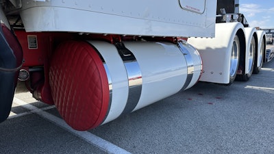 He painted the tanks and added vinyl tank end covers to match the red frame.