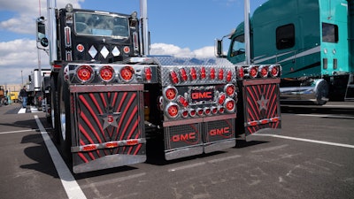 The rear of the truck is all chrome with red accents and plenty of lights.
