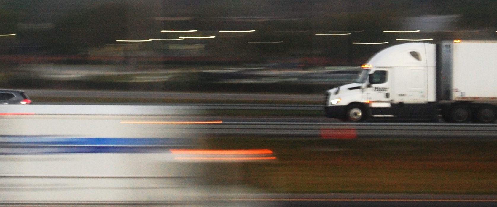 Speed Motion Blur Night Truck On Highway