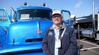 Wayne Trent with his boat-hauling truck built 'One Piece at a Time.'