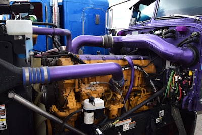 Martin and company bought the 2023 Pete brand-new with a Cummins X15 in it. At the get-go Martin pulled and sold the X15 in exchange for a reman 2WS Caterpillar engine. 'Fewer emissions problems,' he said.