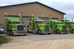 Hallahan Transport's company trucks are painted the company's signature custom green with Omaha orange accents.