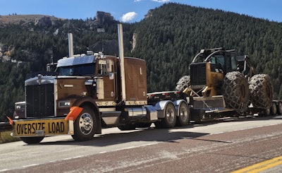 The heavy-haul/oversize trucking niche can be lucrative for owner-operators who know the ins and outs of the business. That doesn't come immediately, nor without significant challenges. Shown here is owner-operator Jason Chamberlain's 1985 Kenworth W900B, powered by a Big Cam Cummins with a 13-speed. He owns two trailers -- a 55-ton, three-axle XL Specialized RGN and a 2017 Benson three-axle, low-pro step deck.