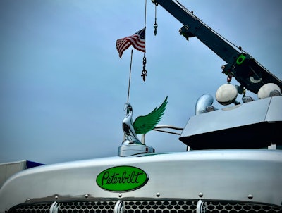 CTS Towing owner and operator Clifton Parsley and his wife, Joyce, are known to raise the flag with their rotator at truck shows from MATS to Walcott.