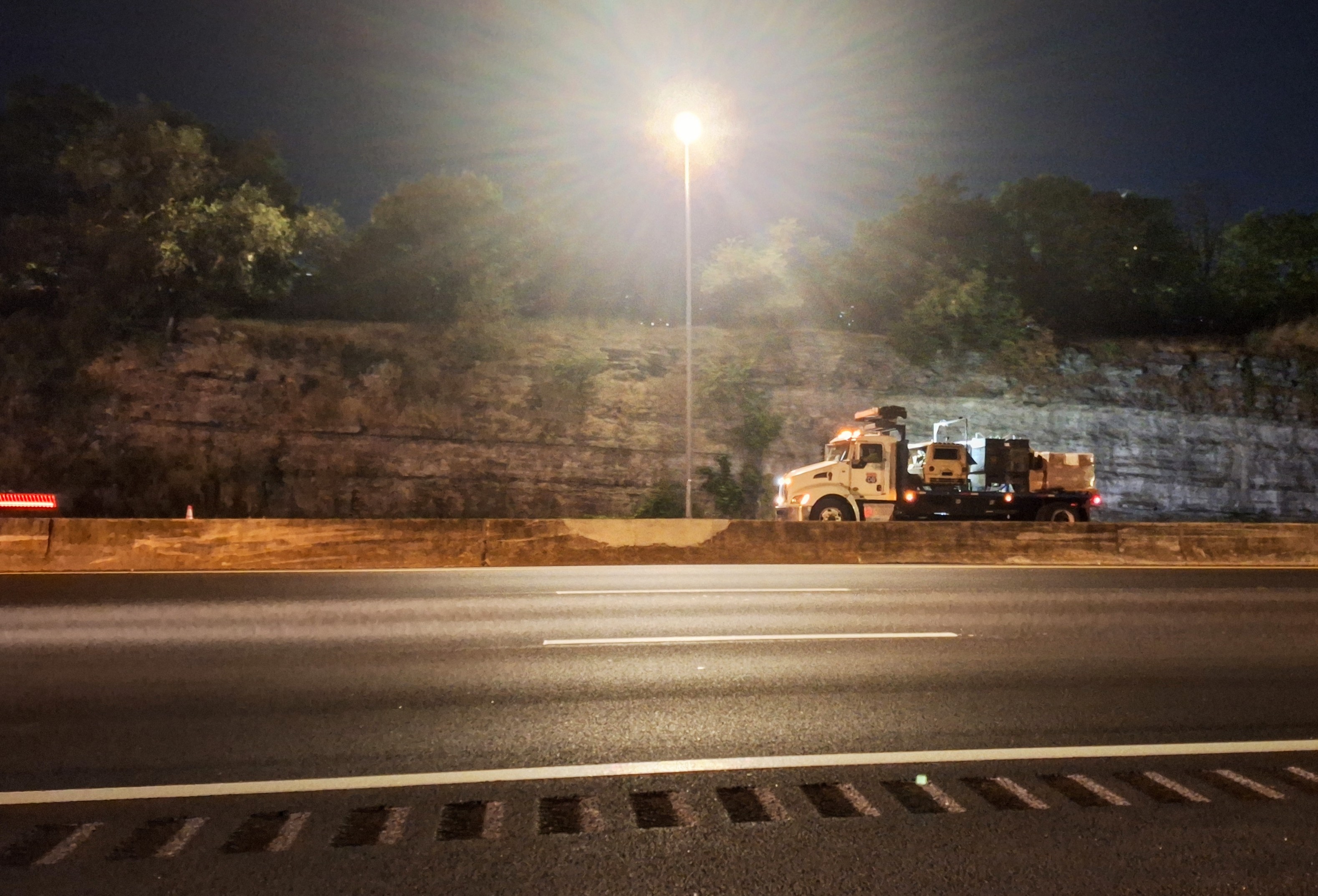 Plenty truck-picture-taking opportunities, too, which I availed myself of. It's road-construction season pretty well everywhere. Sun goes down, the cones and barrels come out.
