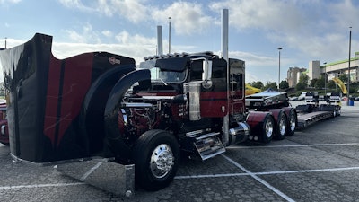 Hunter hauls plenty oversized construction equipment with his 24-truck fleet, headquartered near Pittsburgh. He bought and customized this 2024 Kenworth W900L when he found out the model was going to be discontinued after 2025. Hunter does the dispatching for his fleet, but when he does jump in a truck to work, this is the one he drives currently. It's hooked to a tri-axle Talbert capable of hauling up to 60 tons.