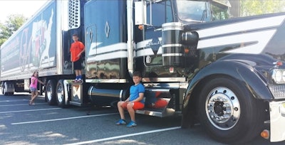 For most of those years Shelly trucked in this 2000 Kenworth W9 he owned for 17-18 years in total. He'd 'put a Double Eagle sleeper on it with bunk beds and a potty and a fridge and a desk,' he said. 'So it was a lot easier to have three children and a dog most weeks.' And though it's hard to make out in the picture, trailer-side advertising for Goods Insurance, long Shelly's coverage partner, adorns the box, one of several side revenue streams the owner-operator found through his decades trucking.