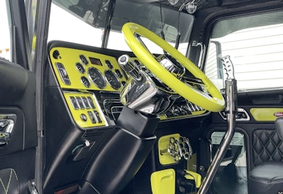 Inside the rig, the dash, steering wheel and more are highlighter yellow to match the accents on the rig.