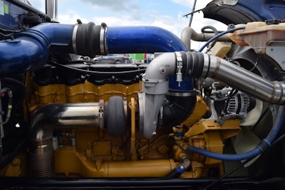 He bought the older-model 3406e. 'We did a few things to it,' he said, and as owner-operator Martin had done, then 'pulled the Cummins out and swapped this Cat in there. Everything went real smooth.'