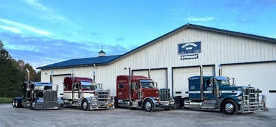 Clifford C. Hay Inc. owns six trucks, with four operating on a day-to-day basis. Some of the small fleet's trucks are shown here parked up in front of the fleet's current shop in Cobleskill, New York.