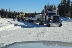 Here two of Muskie Creek's trucks stage for a rough trip over on Ice Road Truckers' triumphant return to TV.