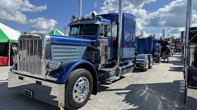 He puts on the biennial extravaganza, so it's only fitting that 4 State Trucks owner Bryan 'Bossman' Martin's immaculate 1987 Peterbilt 359, built by Davis Brothers Designs, is on display front-and-center in front of the chrome shop.