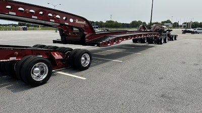 The full trailer boasts 48 tires on the ground, plus two spares, for a total of 60 when including the 10 tractor tires.