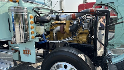 When they had the clutch work done, the engine was pulled for its own coat of paint, likewise a coat on the transmission.