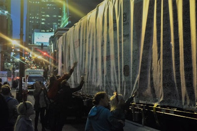 Key attraction for the kiddos and adults alike along the tour: Opportunity to sign tarping over the trailer, as shown here at a stop on the 2019 tour in downtown Nashville, Tennessee.