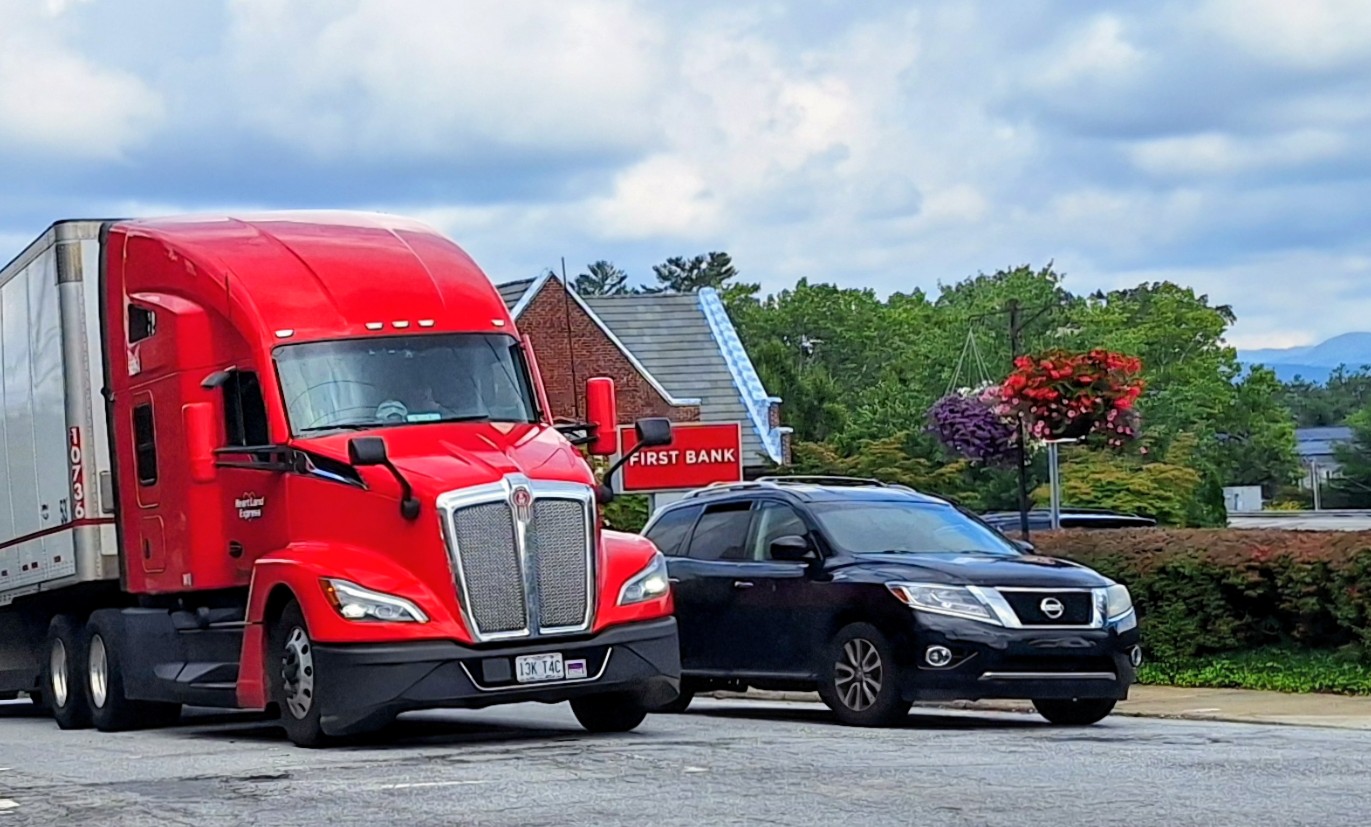 Red Truck Stopped With Car At Light