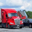 Red Truck Stopped With Car At Light