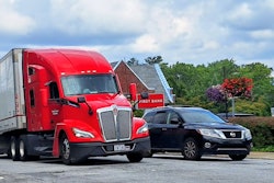 Red Truck Stopped With Car At Light