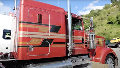 He pulls today in this rebuilt 1996 Kenworth W900L.