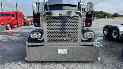 While not featured in this video, as Crombie swapped out some of the parts to be more family-friendly for the truck show, his usual grille “has chrome naked ladies cut out in it.” He also took off other similar pieces “that I put all over it to go with the theme of ‘Pretty Bitchin’.”