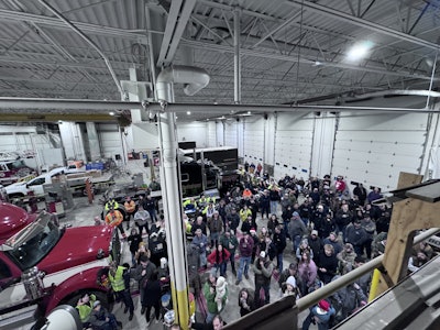 West Michigan International opens up their body shop for convoy participants to hold a driver's meeting before the event kicks off.
