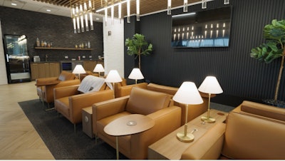 The airport-style driver's lounge offers numerous amenities for truckers waiting for service.