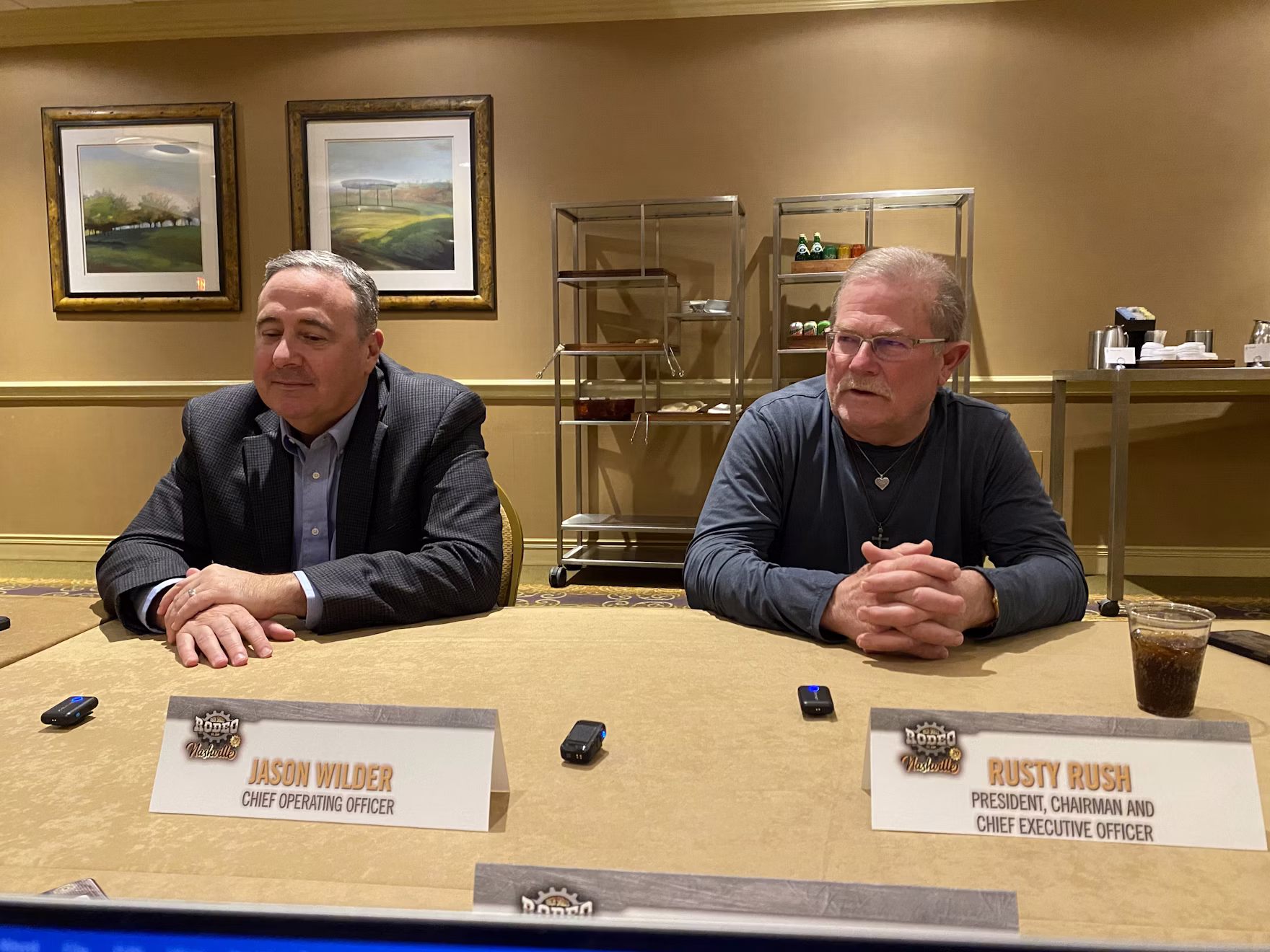 Rush Enterprises executives Jason Wilder, COO, and Rusty Rush, president, chairman and CEO, speak during a press conference Tuesday at the 2025 Rush Tech Skills Rodeo in Nashville.