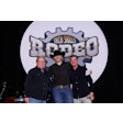 Dom McConnell (center), technician at Rush Truck Centers – Orlando South, was named the all-around Grand Champion at the 2025 Rush Enterprises’ Tech Skills Rodeo Tuesday in Nashville. He is flanked by Rush Chairman, President and CEO Rusty Rush (left) and Clint Bowyer.