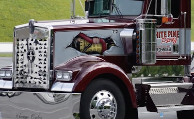 The artist, Justin Perry, “literally took a picture of the motor as it was sitting in our shop and sketched it out on a piece of paper, projected it onto the truck, and started drawing,” Mann said. When you open the hood, “it mirrors what’s underneath.”
