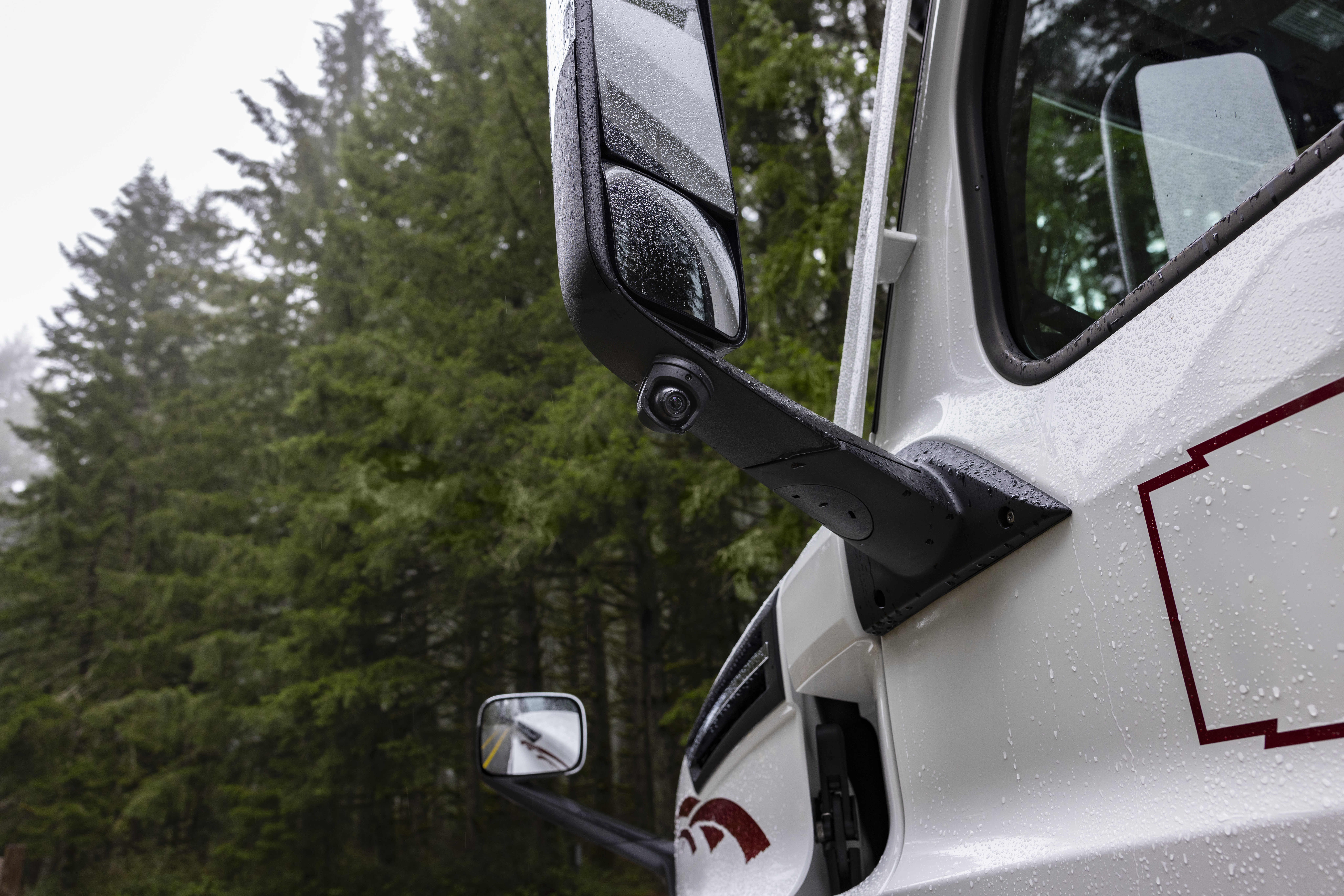 Garmin's new d&emacr;zl DualView camera system features cams for each side of the truck to help drivers monitor blind spots and more.