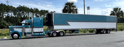 The teal, white and gray scheme now extends from the front bumper all the way to the back of the trailer. He calls the trailer 'Chill Appeal' to go with the tractor's 'Teal Appeal' moniker.