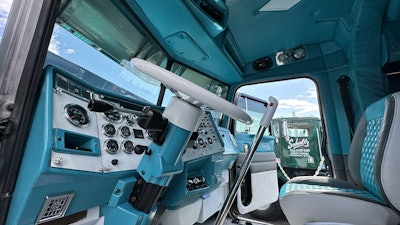 They painted the dash to match the truck’s exterior, and added HushMat on the floor, ceilings, closet, walls and doors. Then Daniel and Sons put all the panels back in it, which also match the color scheme of the unit.