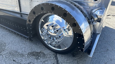 The wheels are 24.5-inch semi-truck wheels that he milled down to 24 inches to be able to put an SUV-style tire on them.