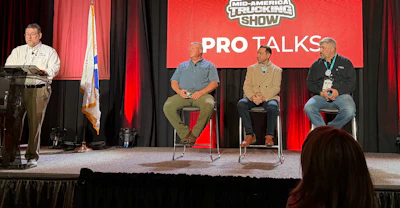 Led by Tom Liberatore (far left), FMCSA's Office of Compliance director, the panel included Ankur Saini, FMCSA's IT director (center on chairs); Shannon Chelf, a training specialist at FMCSA (left on chairs); and Lewie Pugh, the Owner-Operator Independent Driver's Association's Executive Vice President (right).