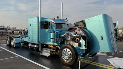 'Blue Collar Roots' is a 2007 Peterbilt 379 built by Stegall's Truck Shop for the Big Rig Build-Off. It's powered by a C15 Cat with a 13-speed and sits on a 295-inch wheelbase.