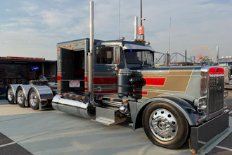 Randy Menkel and Never Satisfied Builds/J&L Contracting took home top honors in the 2026 Big Rig Build-Off at the Mid-America Trucking Show with their full-custom 1985 Peterbilt 359.