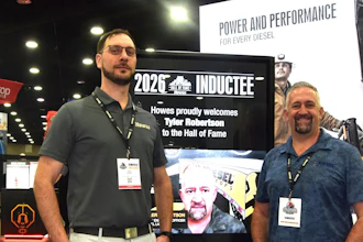 Robertson (right) with Howes President Robert Howes II at the company booth in North Wing of th Kentuck Convention Center, with MATS ongoing through Saturday.