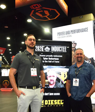 Robertson (right) with Howes President Robert Howes II at the company booth in North Wing of th Kentuck Convention Center, with MATS ongoing through Saturday.